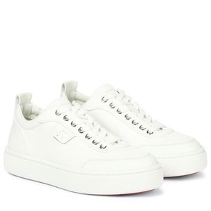 CHRISTIAN LOUBOUTIN
Simplerui canvas sneakers